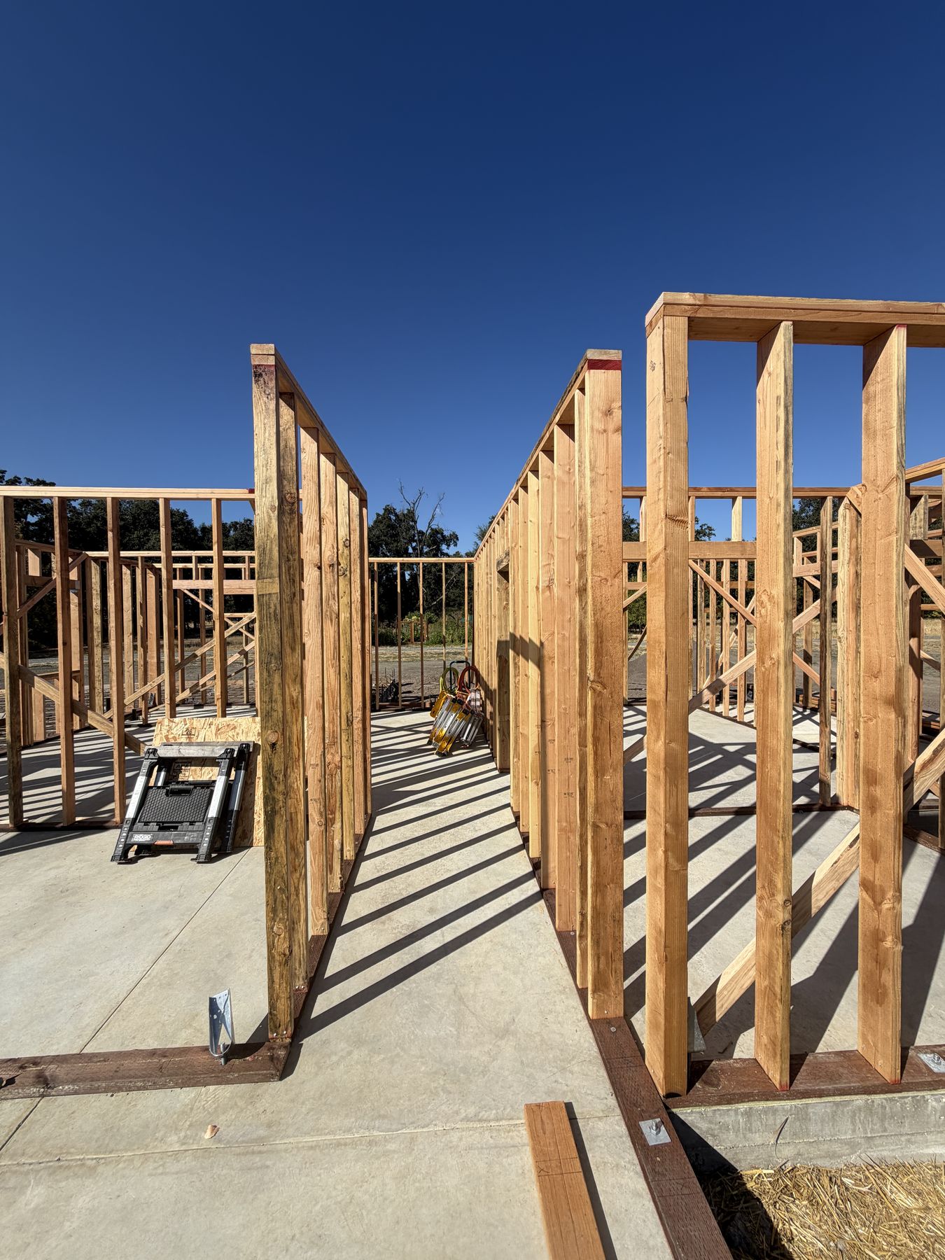 Interior walls framed on the slab, hallway view